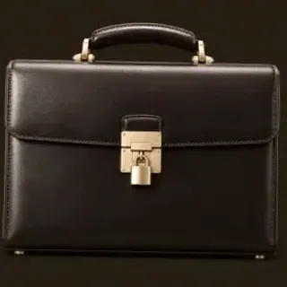 Locked leather briefcase — Royal Reels